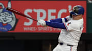 Texas Rangers first baseman Joc Pederson (4) hits a single during the fifth inning against the Arizona Diamondbacks at Globe Life Field.
