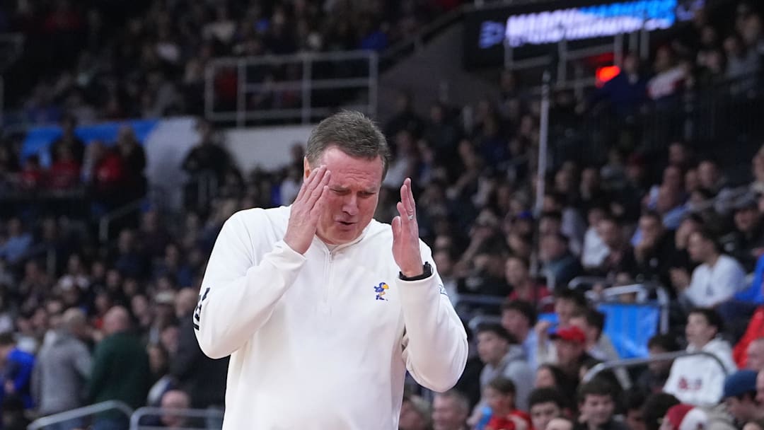 Mar 20, 2025; Providence, RI, USA;  Kansas Jayhawks head coach Bill Self reacts during the first half against the Arkansas Razorbacks at Amica Mutual Pavilion. Mandatory Credit: Gregory Fisher-Imagn Images