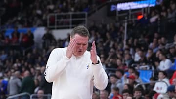 Mar 20, 2025; Providence, RI, USA;  Kansas Jayhawks head coach Bill Self reacts during the first half against the Arkansas Razorbacks at Amica Mutual Pavilion. Mandatory Credit: Gregory Fisher-Imagn Images