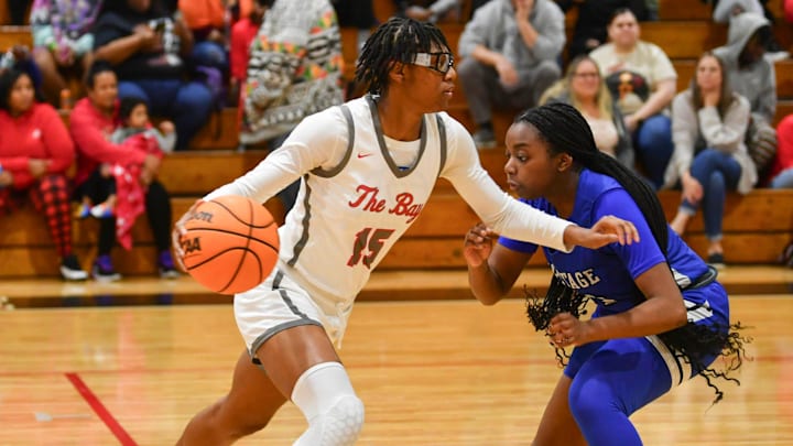 Jaida Civil of Palm Bay drives around Kendra Jean of Heritage in girls basketball Tuesday, December 12, 2023. Craig Bailey/FLORIDA TODAY via USA TODAY NETWORK Jaida Civil of Palm Bay drives around Kendra Jean of Heritage in girls basketball Tuesday, December 12, 2023. Craig Bailey/FLORIDA TODAY via USA TODAY NETWORK