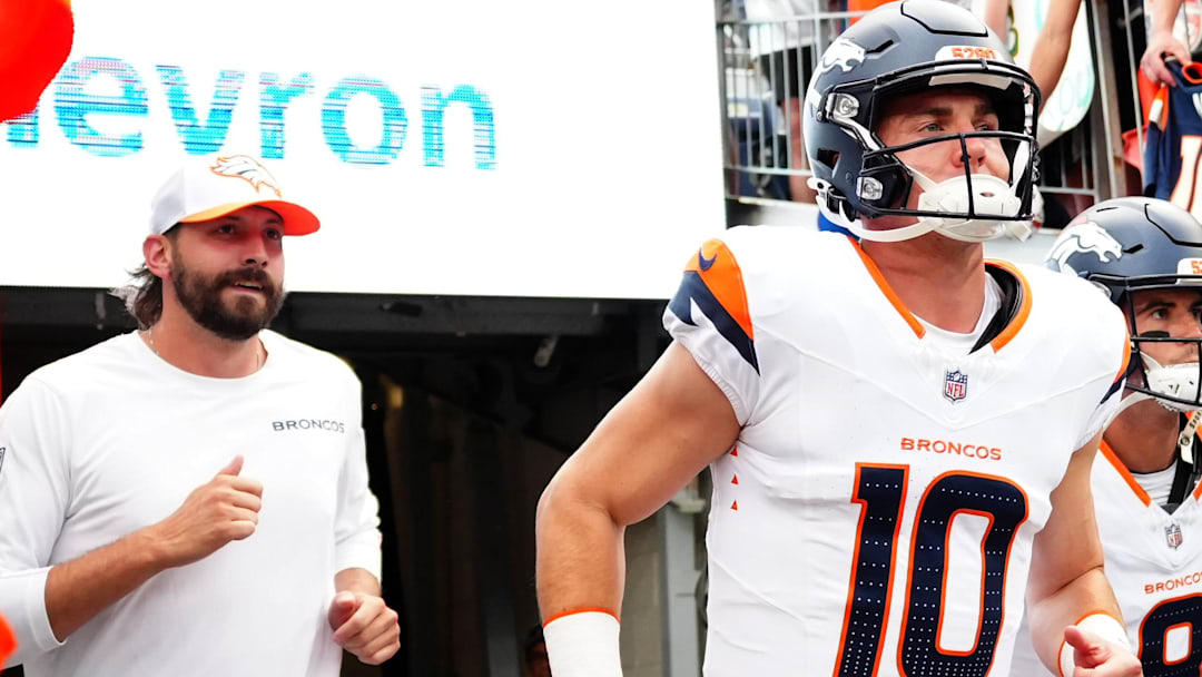 Aug 18, 2024; Denver, Colorado, USA; Denver Broncos quarterback Bo Nix (10) and quarterback Jarrett Stidham (8) before the preseason game against the Green Bay Packers at Empower Field at Mile High. 