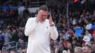 Mar 20, 2025; Providence, RI, USA;  Kansas Jayhawks head coach Bill Self reacts during the first half against the Arkansas Razorbacks at Amica Mutual Pavilion.
