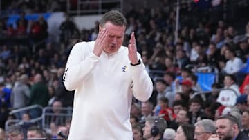 Mar 20, 2025; Providence, RI, USA;  Kansas Jayhawks head coach Bill Self reacts during the first half against the Arkansas Razorbacks at Amica Mutual Pavilion. 