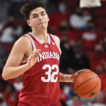 Indiana guard Trey Galloway (32) dribbles against Nebraska in the second half of a game at Pinnacle Bank Arena in 2023.