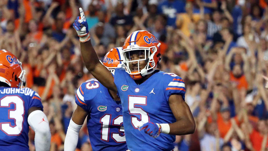 Sep 8, 2018; Gainesville, FL, USA; Florida Gators defensive back CJ Henderson (5) celebrates as he intercepted the ball during the second quarter against the Kentucky Wildcats at Ben Hill Griffin Stadium. Mandatory Credit: Kim Klement-Imagn Images Sep 8, 2018; Gainesville, FL, USA; Florida Gators defensive back CJ Henderson (5) celebrates as he intercepted the ball during the second quarter against the Kentucky Wildcats at Ben Hill Griffin Stadium. Mandatory Credit: Kim Klement-Imagn Images