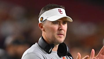 Oct 1, 2022; Los Angeles, California, USA;  USC Trojans head coach Lincoln Riley applauds after a touchdown in the first half against the Arizona State Sun Devils at United Airlines Field at the Los Angeles Memorial Coliseum. Mandatory Credit: Jayne Kamin-Oncea-Imagn Images