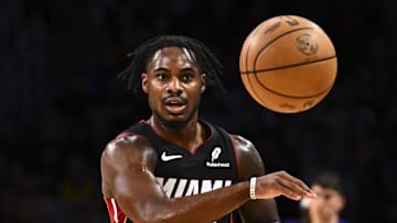 Nov 2, 2025; Los Angeles, California, USA; Miami Heat guard Davion Mitchell (45) passes the ball against the Los Angeles Lakers during the first half at Crypto.com Arena. Mandatory Credit: Jonathan Hui-Imagn Images