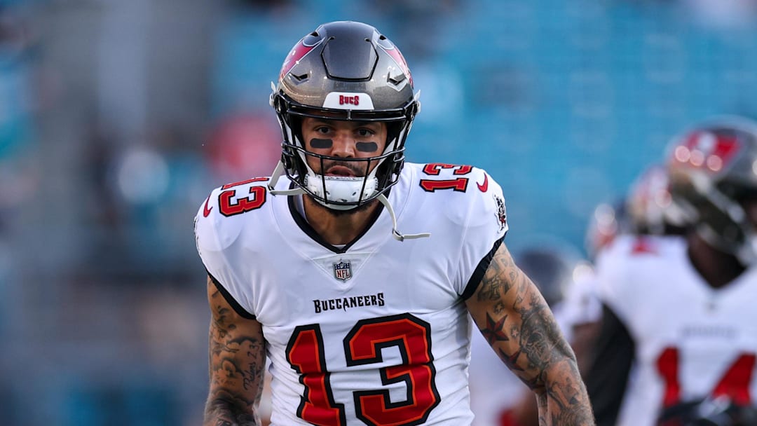Aug 17, 2024; Jacksonville, Florida, USA; Tampa Bay Buccaneers wide receiver Mike Evans (13) warms up before a preseason game against the Jacksonville Jaguars at EverBank Stadium. Mandatory Credit: Nathan Ray Seebeck-Imagn Images