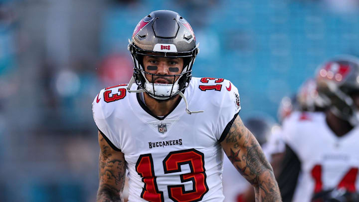 Aug 17, 2024; Jacksonville, Florida, USA; Tampa Bay Buccaneers wide receiver Mike Evans (13) warms up before a preseason game against the Jacksonville Jaguars at EverBank Stadium. Mandatory Credit: Nathan Ray Seebeck-Imagn Images