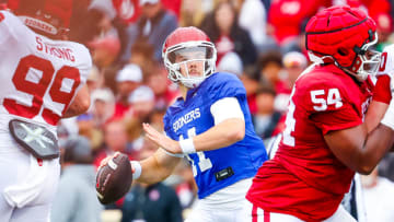 Apr 20, 2024; Norman, OK, USA;  Oklahoma Sooners quarterback Jackson Arnold (11) throws a touchdown pass during the Oklahoma Sooners spring game at Gaylord Family OK Memorial Stadium. Mandatory Credit: Kevin Jairaj-USA TODAY Sports