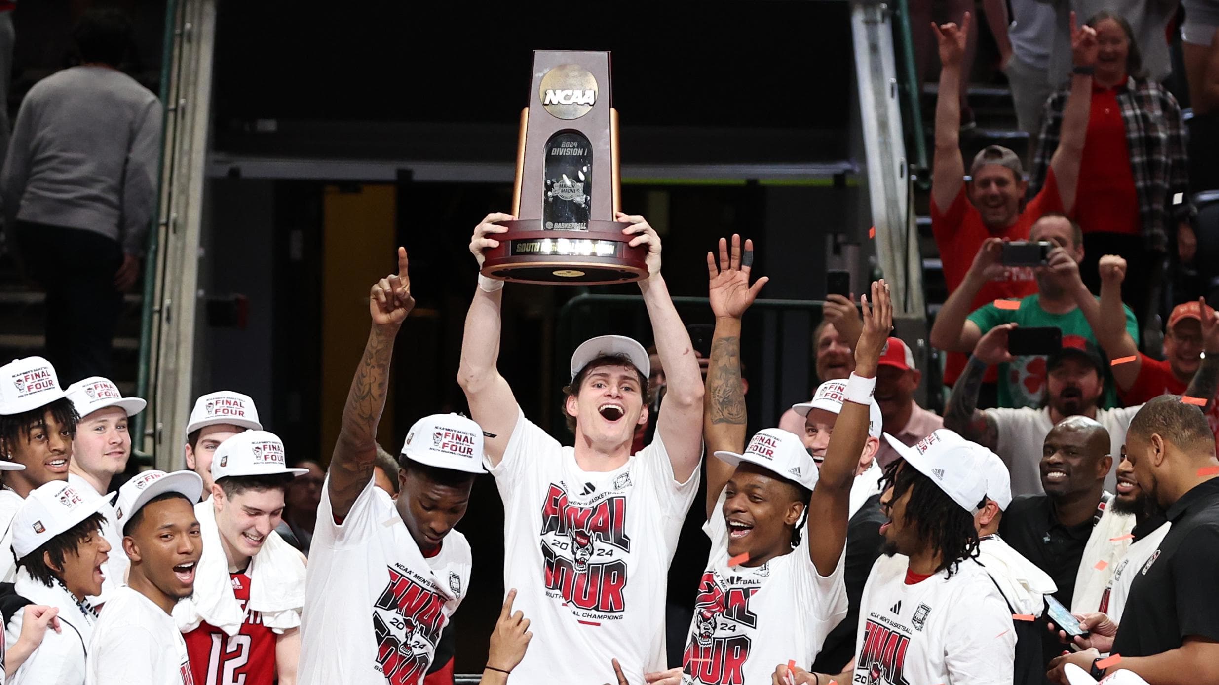 NC State players celebrate after beating Duke to advance to the Final Four.