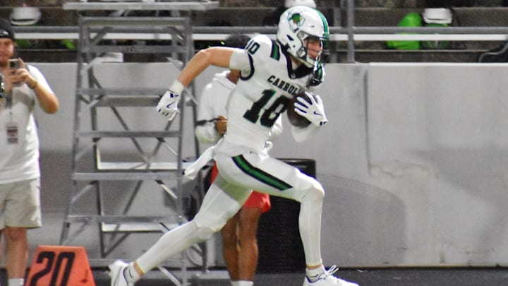 Southlake Carroll's Brody Knowles runs toward the end zone after a catch in the second quarter against Haslet V. R. Eaton in a Thursday night game on Oct. 9 in Justin.