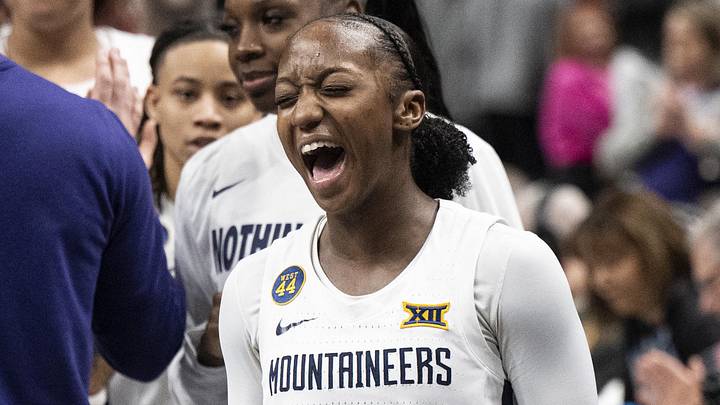 Mar 7, 2025; Kansas City, MO, USA; West Virginia Mountaineers guard Jordan Harrison (10) celebrates after defeating the Kansas State Wildcats at T-Mobile Center. Mandatory Credit: Amy Kontras-Imagn Images