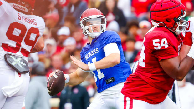 Oklahoma Sooners quarterback Jackson Arnold throws a touchdown pass during the Oklahoma Sooners spring game.