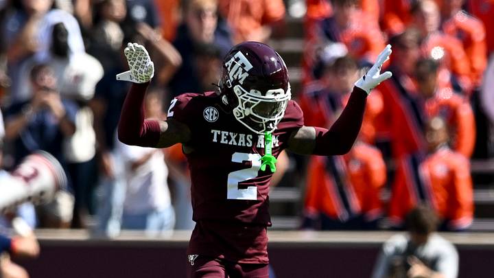 Sep 27, 2025; College Station, Texas, USA; Texas A&M Aggies cornerback Dezz Ricks (2) motions during the first half against the Auburn Tigers at Kyle Field. Mandatory Credit: Maria Lysaker-Imagn Images