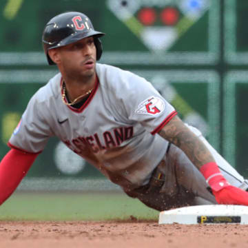 Apr 19, 2025; Pittsburgh, Pennsylvania, USA;  Cleveland Guardians shortstop Brayan Rocchio (left) steals second base without a throw against the Pittsburgh Pirates during the eighth inning at PNC Park. Mandatory Credit: Charles LeClaire-Imagn Images