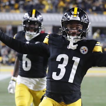 Jan 4, 2025; Pittsburgh, Pennsylvania, USA;  Pittsburgh Steelers cornerback Beanie Bishop Jr. (31) celebrates after intercepting a Cincinnati Bengals pass during the second quarter at Acrisure Stadium. Mandatory Credit: Charles LeClaire-Imagn Images