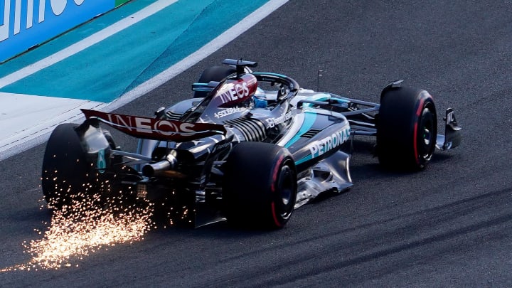 May 4, 2024; Miami Gardens, Florida, USA; Mercedes driver George Russell (63) scrapes the track as sparks fly racing into turn five during qualifying for the Miami Grand Prix at Miami International Autodrome. Mandatory Credit: John David Mercer-USA TODAY Sports