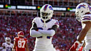 Oct 16, 2022; Kansas City, Missouri, USA; Buffalo Bills cornerback Kaiir Elam (24) celebrates with linebacker Matt Milano (58) and cornerback Dane Jackson (30) after an interception against the Kansas City Chiefs during the first half at GEHA Field at Arrowhead Stadium. Mandatory Credit: Jay Biggerstaff-Imagn Images