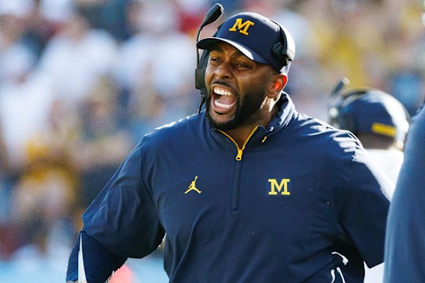 Dec 31, 2024; Tampa, FL, USA; Michigan Wolverines head coach Sherrone Moore screams from the sideline against the Alabama Cri