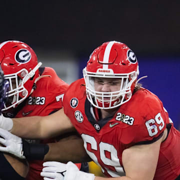 Jan 9, 2023; Inglewood, CA, USA; Georgia Bulldogs offensive lineman Tate Ratledge (69) against the TCU Horned Frogs during the CFP national championship game at SoFi Stadium. Mandatory Credit: Mark J. Rebilas-Imagn Images