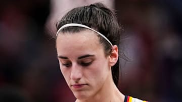 Caitlin Clark walking down the court during the Indiana Fever's loss to the Minnesota Lynx on Friday night. 