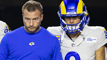 Dec 13, 2021; Glendale, Arizona, USA; Los Angeles Rams head coach Sean McVay with defensive tackle Aaron Donald (99) and quarterback Matthew Stafford (9) against the Arizona Cardinals at State Farm Stadium. Mandatory Credit: Mark J. Rebilas-Imagn Images