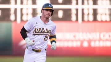 Jul 2, 2024; Oakland, California, USA; Oakland Athletics outfielder Brent Rooker (25) rounds the bases after hitting a home run against the Los Angeles Angels during the fourth inning at Oakland-Alameda County Coliseum. Mandatory Credit: Ed Szczepanski-USA TODAY Sports