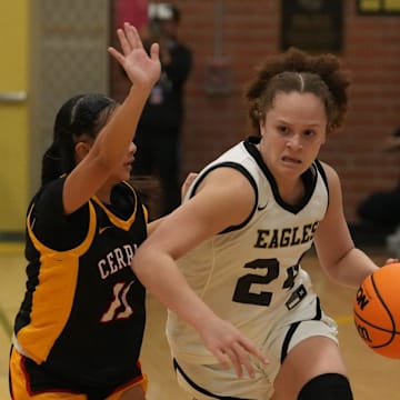Oak Park tries to drive pass Cerritos during the CIF-SS Division 3AA girls basketball final at Edison High School in Huntington Beach on Saturday, Feb. 24, 2024. Oak Park won, 71-41, for its second straight CIF-SS title.