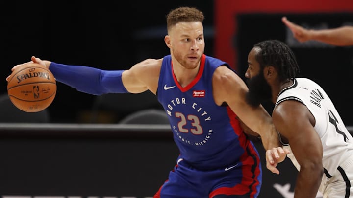 Feb 9, 2021; Detroit, Michigan, USA; Detroit Pistons forward Blake Griffin (23) controls the ball while defended by Brooklyn Nets guard James Harden (R) during the first quarter at Little Caesars Arena. Mandatory Credit: Raj Mehta-Imagn Images