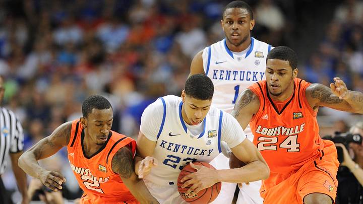 Mar 31, 2012; New Orleans, LA, USA; Kentucky Wildcats forward Anthony Davis (23) battles for the ball between Louisville Cardinals guard Russ Smith (2) and forward Chane Behanan (24)  during the first half in the semifinals of the 2012 NCAA men's basketball Final Four at the Mercedes-Benz Superdome. Mandatory Credit: Bob Donnan-USA TODAY Sports