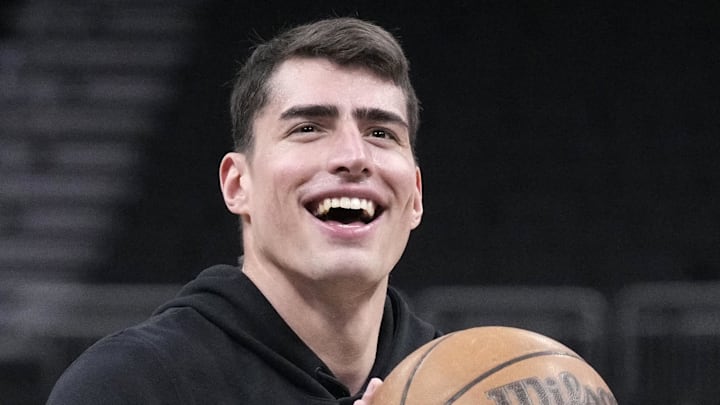 Mar 2, 2026; Milwaukee, Wisconsin, USA; Boston Celtics center Luka Garza (52) shoots during pregame warmups before a game against the Milwaukee Bucks at Fiserv Forum. Mandatory Credit: Michael McLoone-Imagn Images