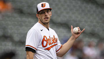 Aug 22, 2021; Baltimore, Maryland, USA; Baltimore Orioles starting pitcher John Means (47) reacts before being relived during the seventh inning against the Atlanta Braves at Oriole Park at Camden Yards. Mandatory Credit: Scott Taetsch-Imagn Images