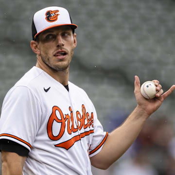 Aug 22, 2021; Baltimore, Maryland, USA; Baltimore Orioles starting pitcher John Means (47) reacts before being relived during the seventh inning against the Atlanta Braves at Oriole Park at Camden Yards. Mandatory Credit: Scott Taetsch-Imagn Images