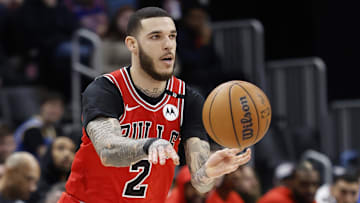 Feb 2, 2025; Detroit, Michigan, USA; Chicago Bulls guard Lonzo Ball (2) passes in the first half against the Detroit Pistons at Little Caesars Arena. Mandatory Credit: Rick Osentoski-Imagn Images