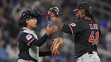 May 4, 2025; Toronto, Ontario, CAN; Cleveland Guardians pitcher Emmanuel Clase (48) and catcher Bo Naylor (23) celebrate a win over the Toronto Blue Jays at Rogers Centre. Mandatory Credit: John E. Sokolowski-Imagn Images
