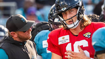 Jacksonville Jaguars head coach Liam Coen talks with Jacksonville Jaguars quarterback Trevor Lawrence (16) between plays before an NFL scrimmage at EverBank Stadium Friday August 1, 2025, in Jacksonville, Fla. [Doug Engle/Florida Times-Union]