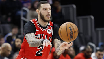 Feb 2, 2025; Detroit, Michigan, USA; Chicago Bulls guard Lonzo Ball (2) passes in the first half against the Detroit Pistons at Little Caesars Arena. Mandatory Credit: Rick Osentoski-Imagn Images