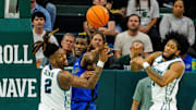 Jan 30, 2025; New Orleans, Louisiana, USA;  Memphis Tigers center Moussa Cisse (32) knocks the ball free from Tulane Green Wave forward Greg Glenn III (2) during the second half at Avron B. Fogelman Arena in Devlin Fieldhouse.