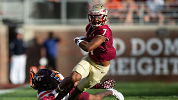 Florida State Seminoles wide receiver Destyn Hill (7) attempts to outrun a tackle.The Florida State Seminoles defeated the Virginia Tech Hokies 39-17 at Doak Campbell Stadium on Saturday, Oct. 7, 2023.