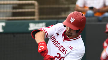Indiana's Nick Mitchell (20) hits the ball during a NCAA Baseball Tournament Knoxville Regional game at Lindsey Nelson Stadium on Sunday, June 2, 2024 in Knoxville, Tenn.