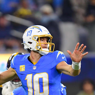Nov 9, 2025; Inglewood, California, USA; Los Angeles Chargers quarterback Justin Herbert (10) passes the ball against the Pittsburgh Steelers during the third quarter of the game at SoFi Stadium. Mandatory Credit: Gary A. Vasquez-Imagn Images