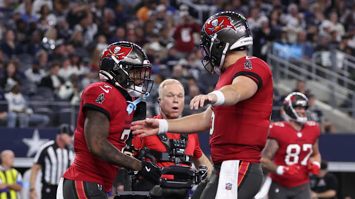Tampa Bay Buccaneers running back Bucky Irving celebrates with quarterback Baker Mayfield after a touchdown. Tampa Bay Buccaneers running back Bucky Irving celebrates with quarterback Baker Mayfield after a touchdown.