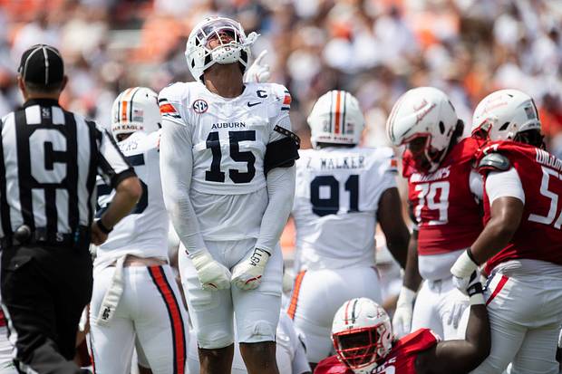 Auburn Tigers defensive end Keldric Faulk celebrates a stop as the Auburn Tigers take on the South Alabama Jaguars.