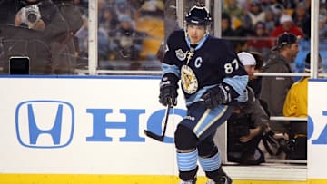Jan 1, 2011; Pittsburgh, PA, USA; Pittsburgh Penguins center Sidney Crosby (87) skates onto the ice for the second period of the 2011 Winter Classic against the Washington Capitals at Heinz Field. Mandatory Credit: Jason Bridge-Imagn Images