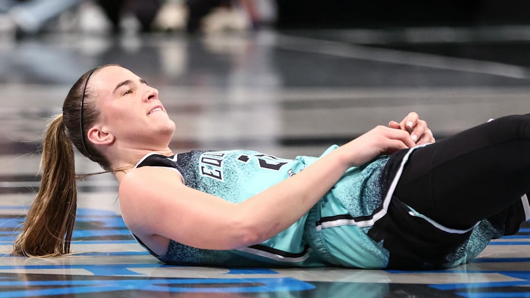 Aug 19, 2025; Brooklyn, New York, USA;  New York Liberty guard Sabrina Ionescu (20) reacts after getting fouled after a made three point shot in the fourth quarter against the Minnesota Lynx at Barclays Center. Mandatory Credit: Wendell Cruz-Imagn Images