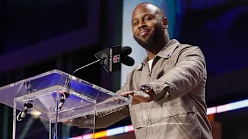 Apr 25, 2025; Green Bay, WI, USA; Former New England Patriots running back James White announces the team’s selection with the 95th overall pick during the 2025 NFL Draft at Lambeau Field. Mandatory Credit: Tork Mason/USA Today Network via Imagn Images