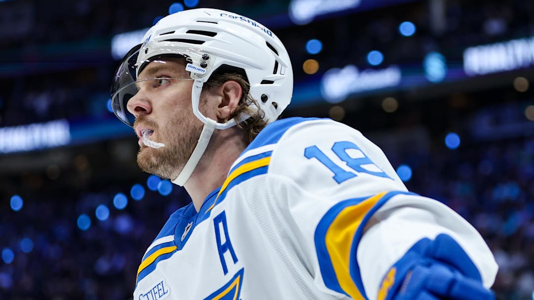 Mar 4, 2026; Seattle, Washington, USA; St. Louis Blues center Robert Thomas (18) looks on in first period against the Seattle Kraken at Climate Pledge Arena. Mandatory Credit: Kevin Ng-Imagn Images