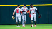 May 19, 2024; Arlington, Texas, USA; Los Angeles Angels outfielder Kevin Pillar (12) and Los Angeles Angels outfielder Mickey Moniak (16) and Los Angeles Angels outfielder Jo Adell (7) celebrate after the game against the Texas Rangers at Globe Life Field. Mandatory Credit: Kevin Jairaj-USA TODAY Sports