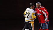 Nov 8, 2024; Washington, District of Columbia, USA; Pittsburgh Penguins center Sidney Crosby (87) and Washington Capitals left wing Alex Ovechkin (8) shake hands after a puck drop ceremony prior to their game at Capital One Arena. Mandatory Credit: Geoff Burke-Imagn Images